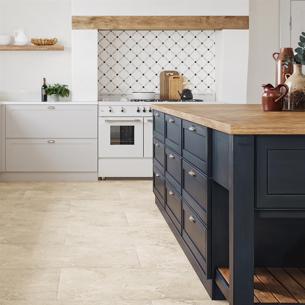 Large barn kitchen with antique floor tiles and matching patterned backsplash tiles